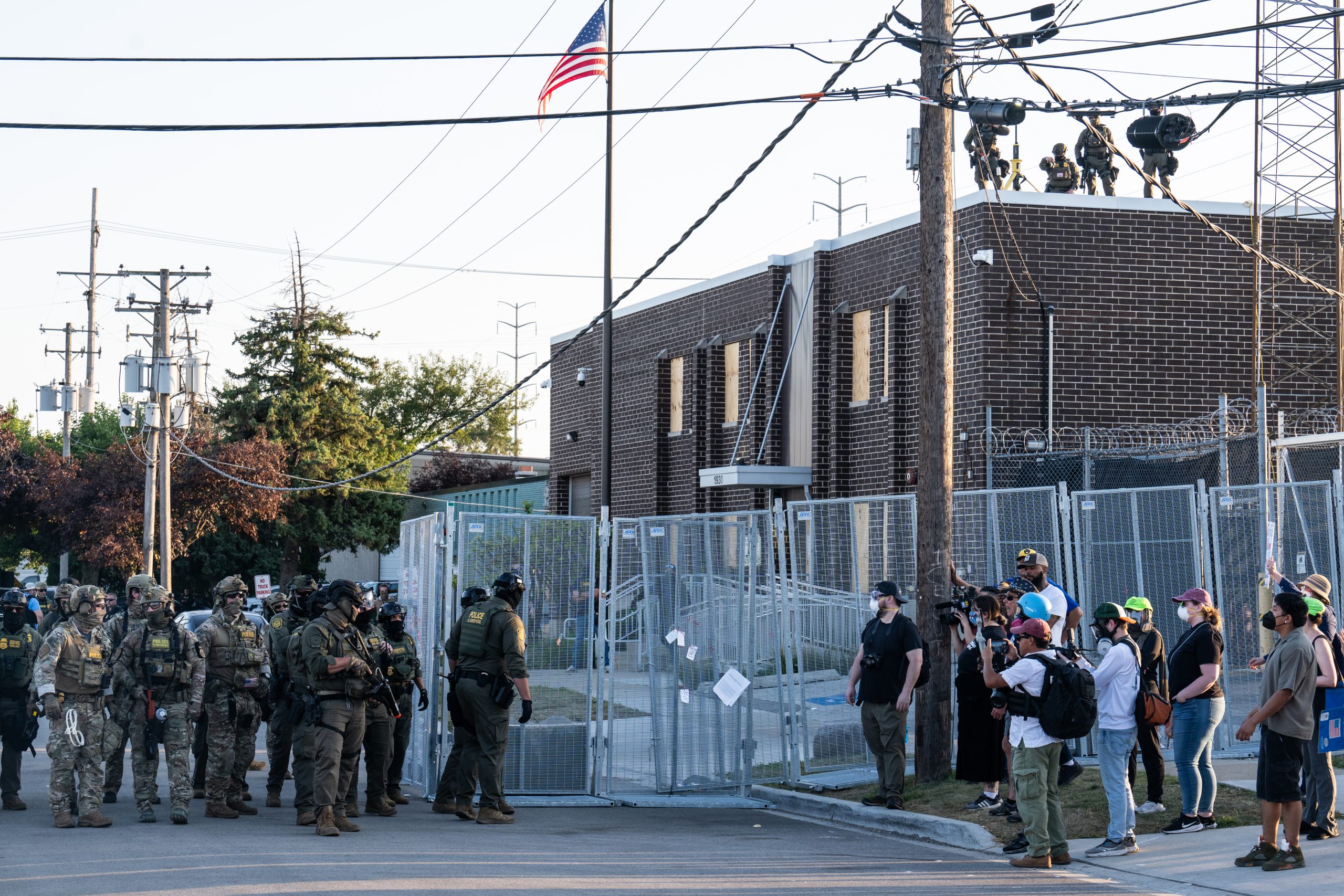 Crowd watching ICE agents
